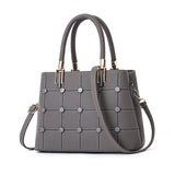 Rivet Style Women's Handbag